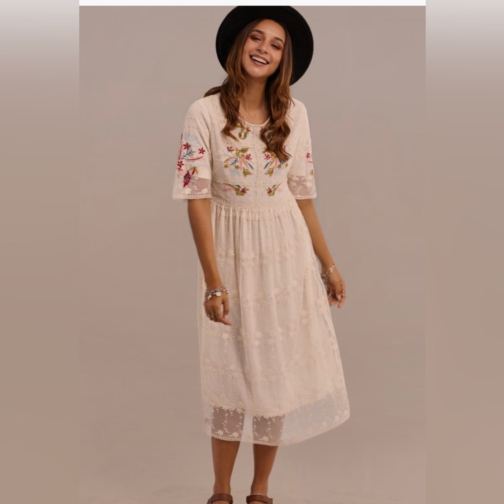 Half sleeved embroidered dress